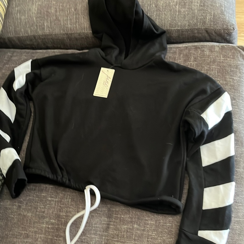 Pinc black hoody with white chevron sleeve kids size 10-12 medium.